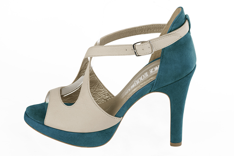 French elegance and refinement for these champagne white and peacock blue closed back dress sandals, with crossed straps, 
                available in many subtle leather and colour combinations. This pretty platform sandal will make you forget the height of its stable heel.
It will wrap your forefoot.
Its adjustable cross straps will hold your instep.
To dance until the end of the night.  
                Matching clutches for parties, ceremonies and weddings.   
                You can customize these sandals to perfectly match your tastes or needs, and have a unique model.  
                Choice of leathers, colours, knots and heels. 
                Wide range of materials and shades carefully chosen.  
                Rich collection of flat, low, mid and high heels.  
                Small and large shoe sizes - Florence KOOIJMAN